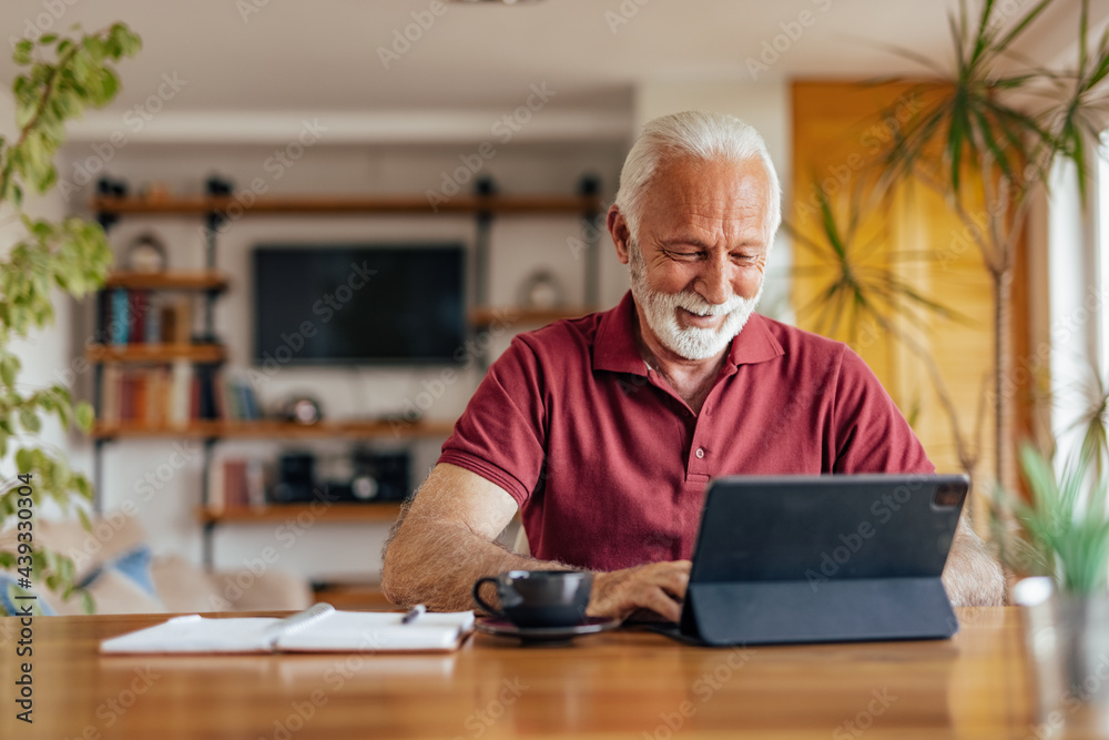 © bnenin - Senior man, having a business meeting, online. © bnenin - Senior man, having a business meeting, online.