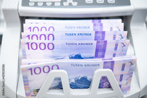 фотографія Norwegian Kroner Banknotes Inside Bill Counter