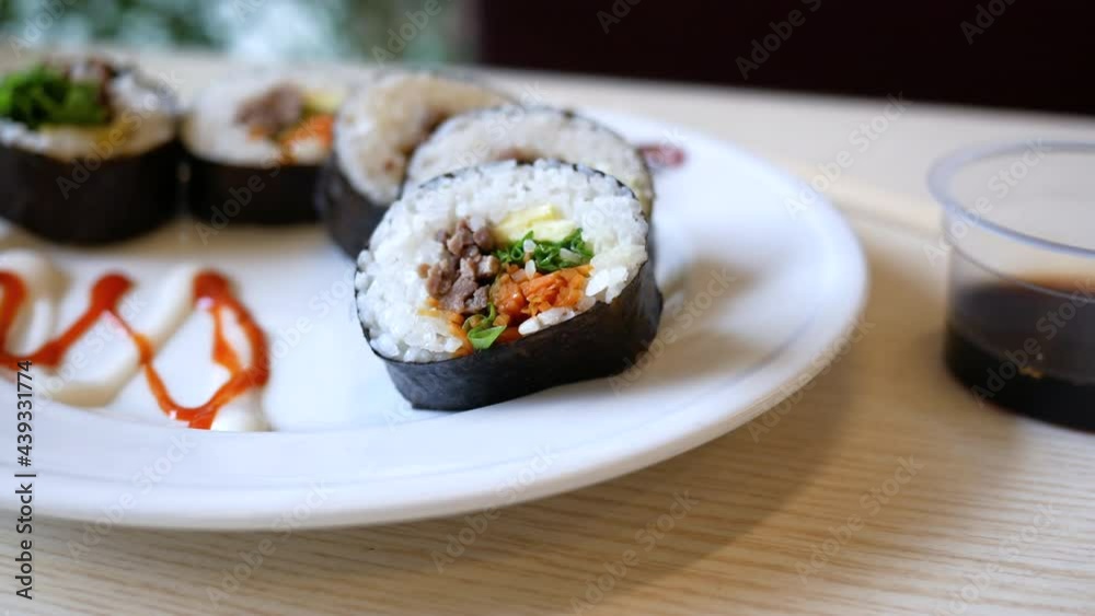 tuna Sushi on plate with chopstick on table tuna Sushi on plate with chopstick on table
