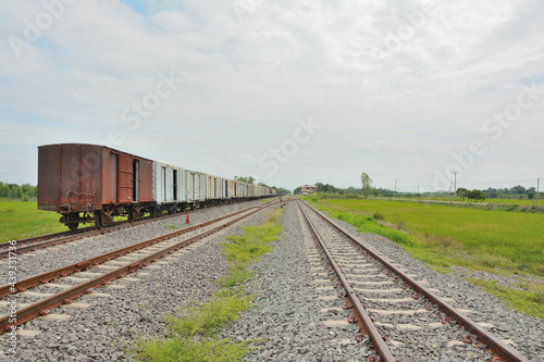 Group of Old train bogies on rails with sky background