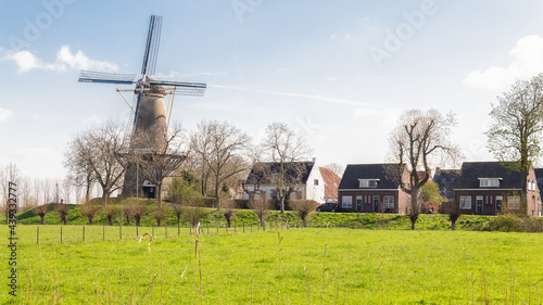 View of the windmill 'Prins van Oranje' of the picturesque old village Buren in Neder-Betuwe, Gelderland, The Netherlands. photo