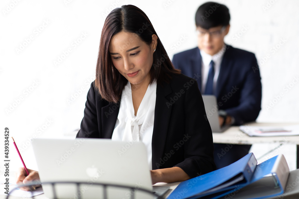 Attractive businesswoman and man manager are colleagues working together