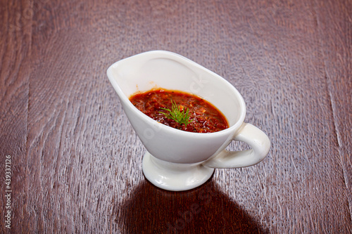 Caucasian traditional Adjika sauce in the bowl