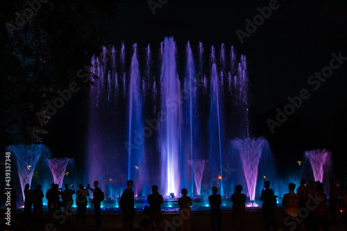 Magical fountain in Margaret Island Budapest by night. It works according to the rhythm of the music in different colors and shapes