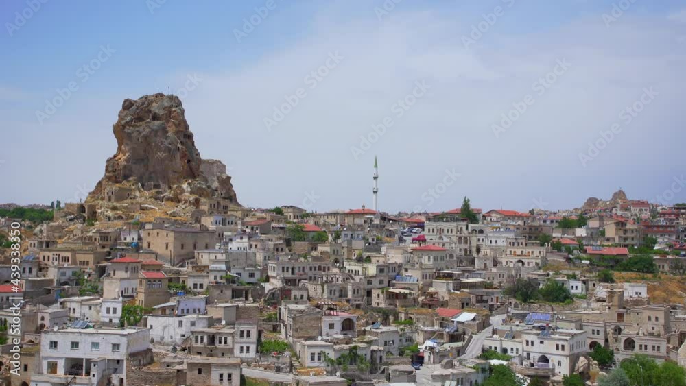 Aerial view of cityscape in Cappadocia. Ortahisar cave city with modern and old architecture, Turkey Aerial view of cityscape in Cappadocia. Ortahisar cave city with modern and old architecture, Turkey