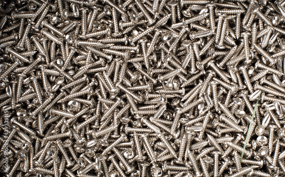 Background texture of metal screws. tapping screws made by steel. Background texture of metal screws. tapping screws made by steel.
