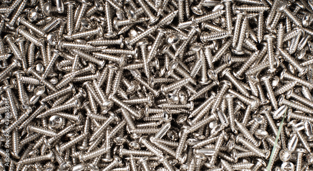 Background texture of metal screws. tapping screws made by steel. Background texture of metal screws. tapping screws made by steel.