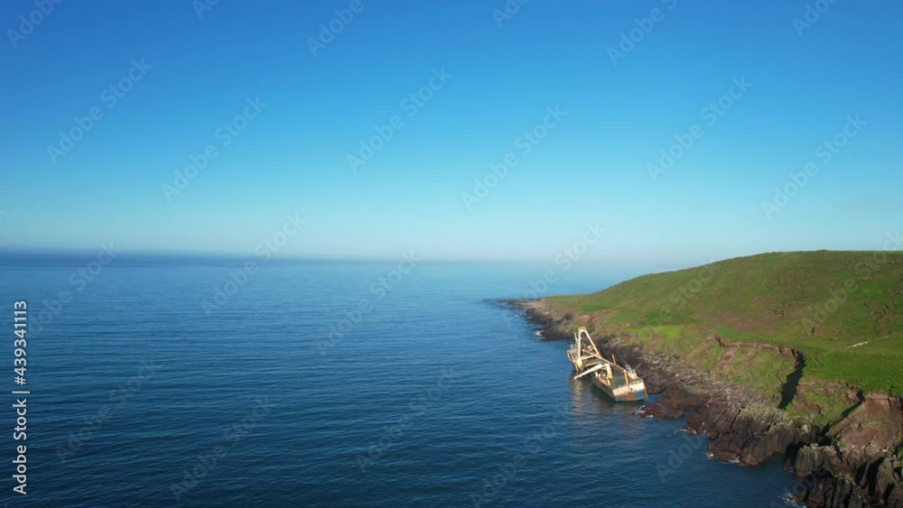 An abandoned ship washed onto rocks near Ballycotton in east Cork after storm Dennis hit Ireland An abandoned ship washed onto rocks near Ballycotton in east Cork after storm Dennis hit Ireland