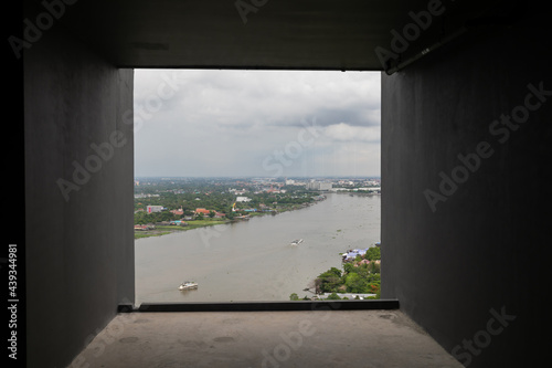 Nonthaburi ,Thailand. -MAY 28, 2019 Top view of city and Chao Phraya River and Nonthaburi Bridge. Location in Nonthaburi province, Thailand