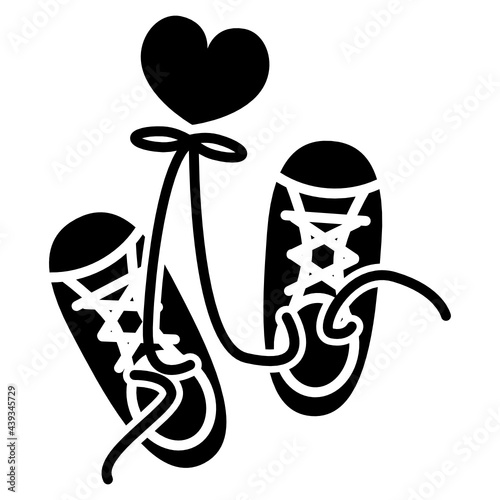 pair of sneaker with heart glyph icon