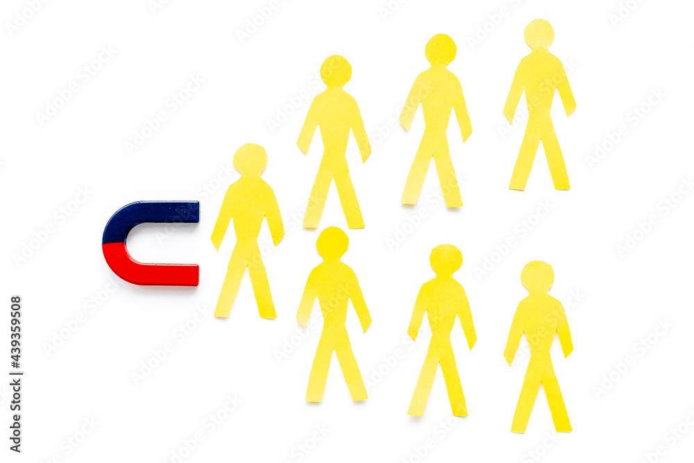 Increase team concept with horseshoe magnet and human figures Increase team concept with horseshoe magnet and human figures