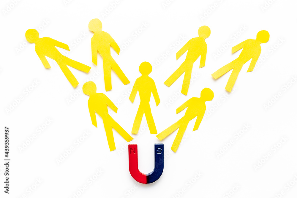 Horseshoe magnet attractives human figures. Increase team and recruiting concept Horseshoe magnet attractives human figures. Increase team and recruiting concept