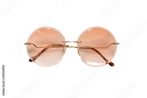 Round summer sunglasses isolated on a white background.