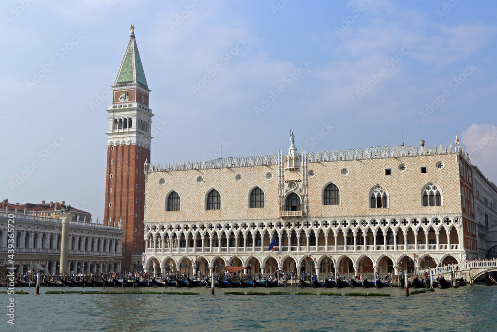 The bell tower of San Marco and the Palazzo Ducale seen from the Grand Canal during a boat trip.