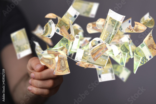 euro bills flying around  i...