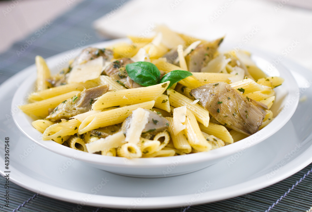 Pasta with Artichokes, Cheese and Herbs. High quality photo. Pasta with Artichokes, Cheese and Herbs. High quality photo.