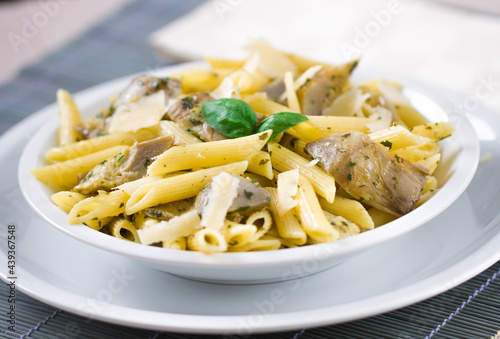 Pasta with Artichokes, Cheese and Herbs. High quality photo.