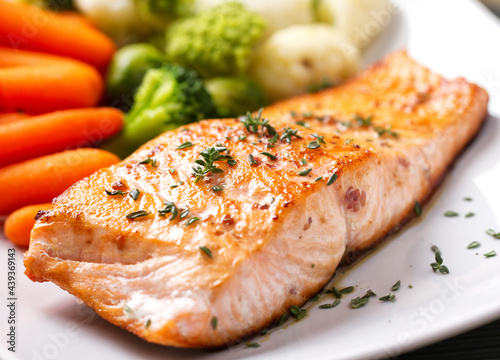 Salmon Fillet with Mixed Steamed Vegetables. High quality photo.
