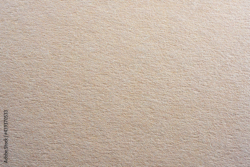 Colored paper with strong structure as a background, photographed in the studio