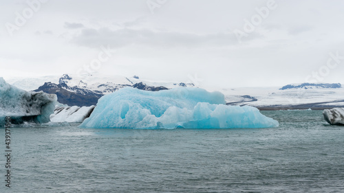 View of icebergs in Jokulsarlon glacier lagoon formed with melting ice  Iceland  global warming and climate change concept