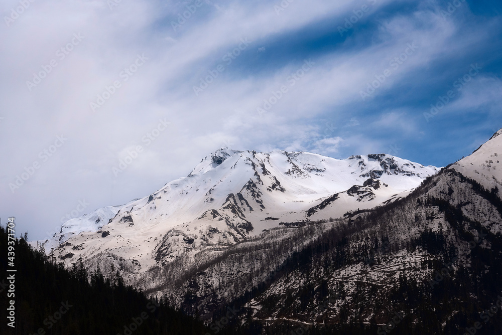 Snow-capped mountain slopes of the Caucasus mountains in early spring Snow-capped mountain slopes of the Caucasus mountains in early spring