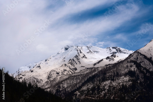 Snow-capped mountain slopes of the Caucasus mountains in early spring