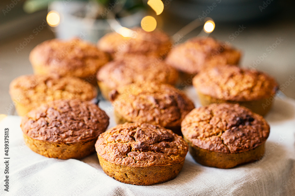 Pumpkin muffins on kitchen. Dietary product. Useful children's dessert. Bright. Seasonal product. Vegan diet Pumpkin muffins on kitchen. Dietary product. Useful children's dessert. Bright. Seasonal product. Vegan diet
