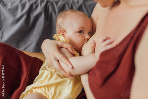 Motherhood: Breastfeeding Like Most Important Contact With Mother And Child photo