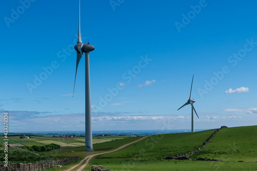 A pair of wind turbines on Royd Moor wind farm in South Yorkshire photo