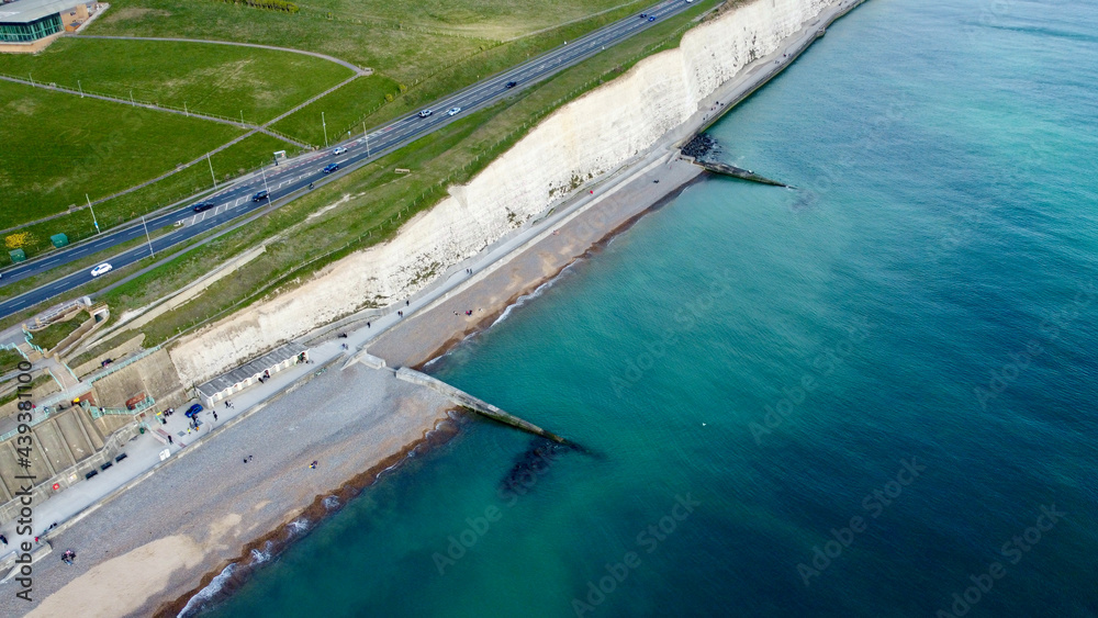 Aerial view of white cliffs and coastline.