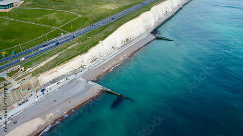Aerial view of white cliffs and coastline.