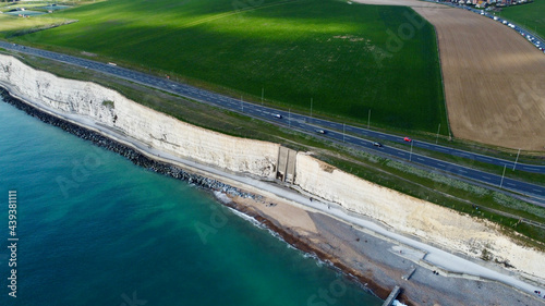 Aerial view of white cliffs and coastline.