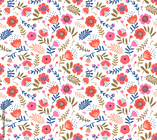 Vector seamless pattern. Folk pattern in small flowers. Small red and pink flowers. White background. Ditsy floral background. The elegant the template for fashion prints. Stock vector.