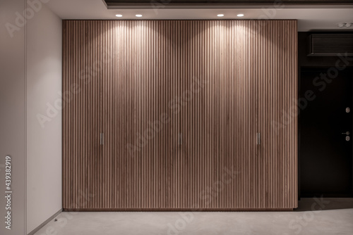 Interior of illuminated modern flat with light walls