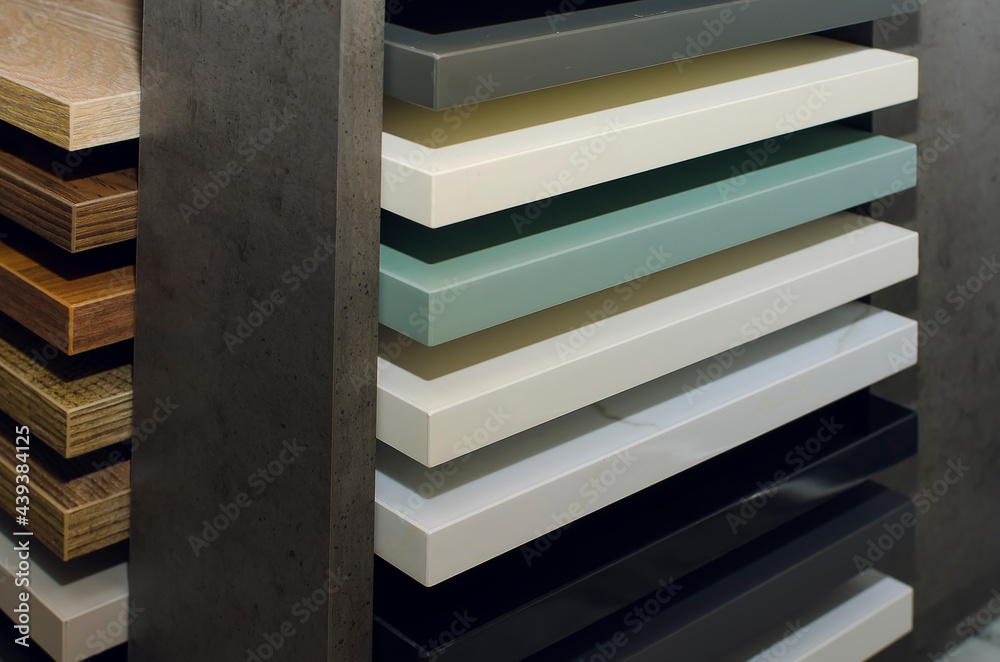 The furniture store presents samples of laminate for the production of