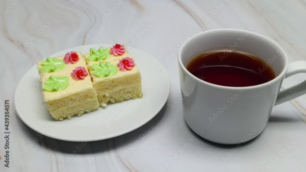 A Cup Of Tea On The Table With Slices Of Cake. Slider Shot. A Cup Of Tea On The Table With Slices Of Cake. Slider Shot.