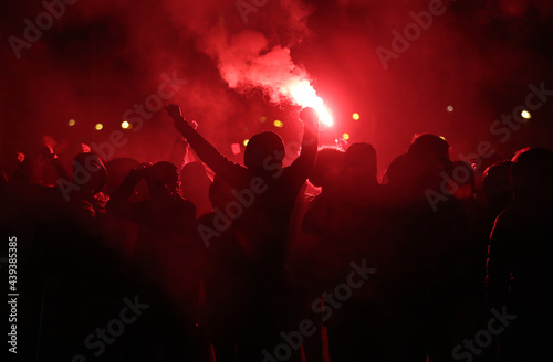 Football fans with torches