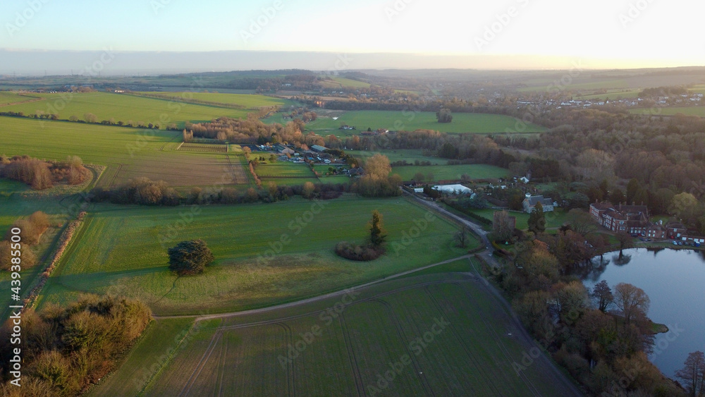 Aerial sunrise on English countryside.