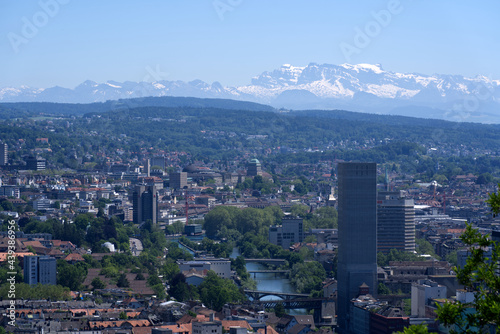 Panorama view over the City of Zurich with river Limmat and Swiss alps in the background at a beautiful summer day. Photo taken June 14th, 2021, Zurich, Switzerland.