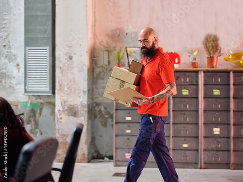 Delivery man with packages. photo