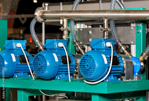 Slika na platnu Electric motors in a production line to generate air pressure in a pipeline