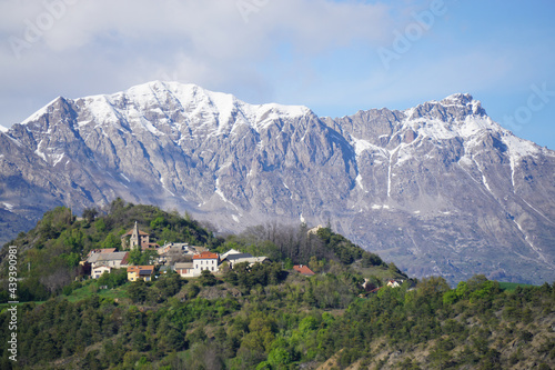 small perched village in the Alps, France on a spring day © poupine