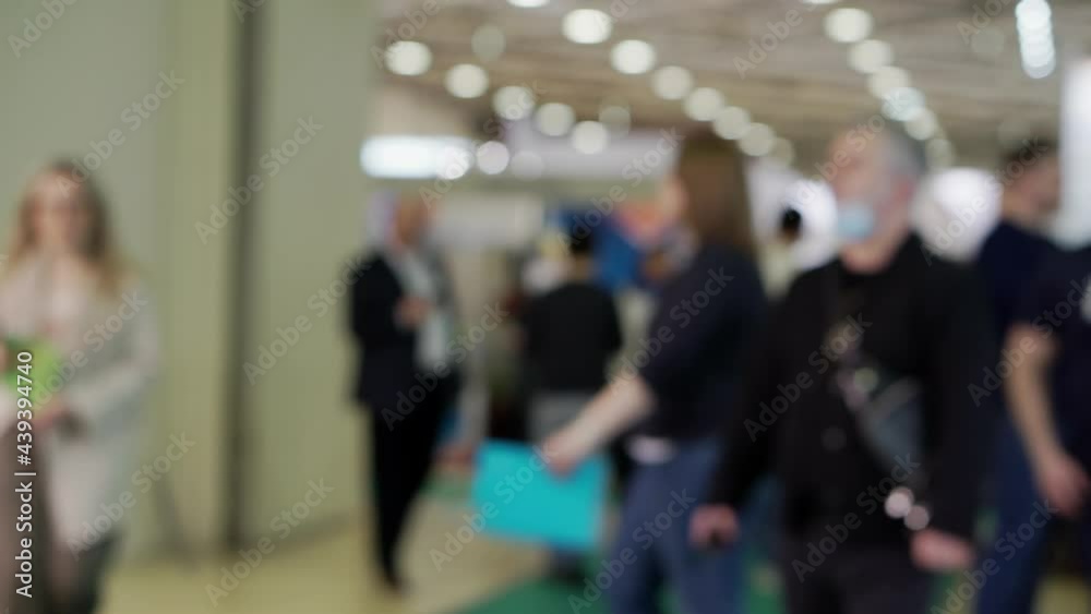 Blurred image with silhouettes of people. Blurred image with silhouettes of people.