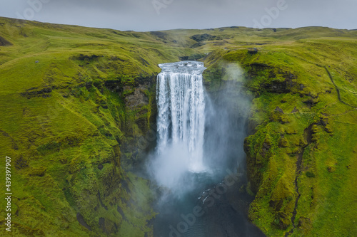 Iceland. Aerial view on the Skogafoss waterfall. Landscape in the Iceland from air. Famous place in Iceland. Landscape from drone. Travel concept © Igor Tichonow