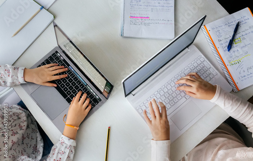Girls studying at home