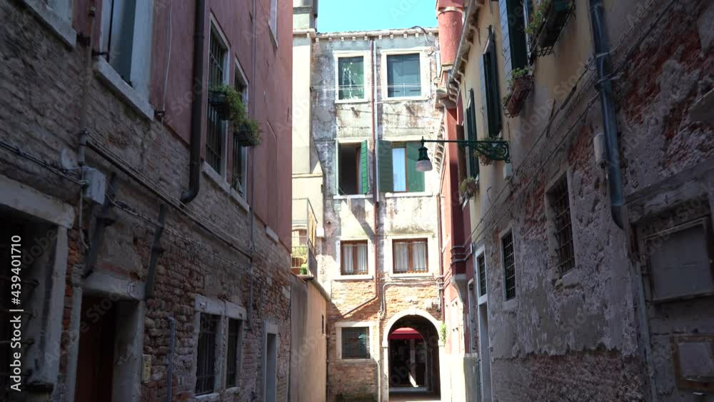 Venice, Italy - June 2021 - Walking through the less touristy streets of the lagoon city, among lesser-known canals, bridges and houses Venice, Italy - June 2021 - Walking through the less touristy streets of the lagoon city, among lesser-known canals, bridges and houses