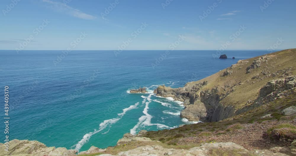 Serene Ocean With Coastal Cliffs At St Agnes Head In Cornwall, UK. - Wide Shot Serene Ocean With Coastal Cliffs At St Agnes Head In Cornwall, UK. - Wide Shot