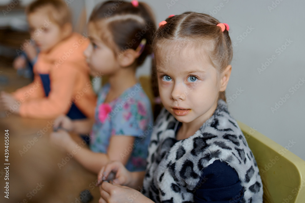 group of 5 year old preschool children in an art school learn to sculpt from clay group of 5 year old preschool children in an art school learn to sculpt from clay