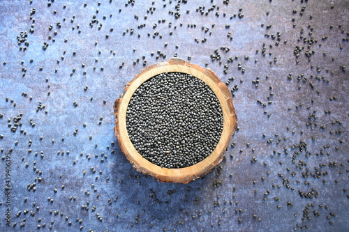 Raw whole dried black Urad lentils