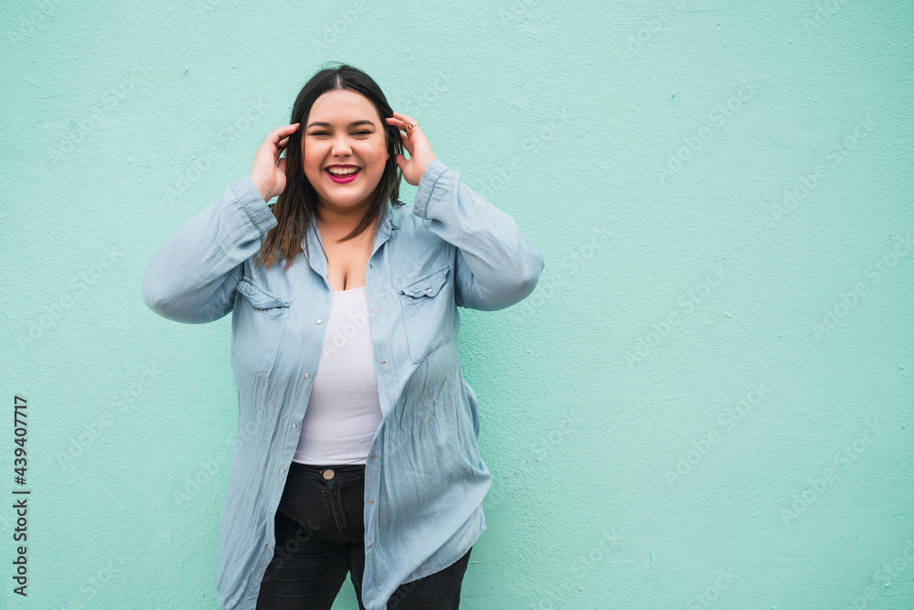 Portrait of young plus size woman.